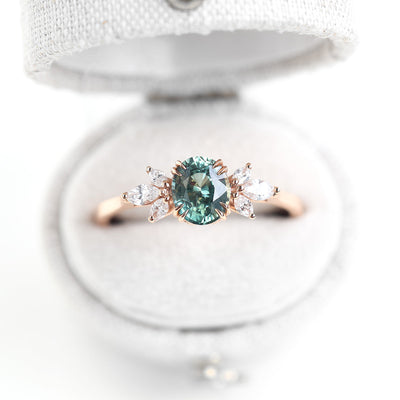 Teal sapphire and diamond ring