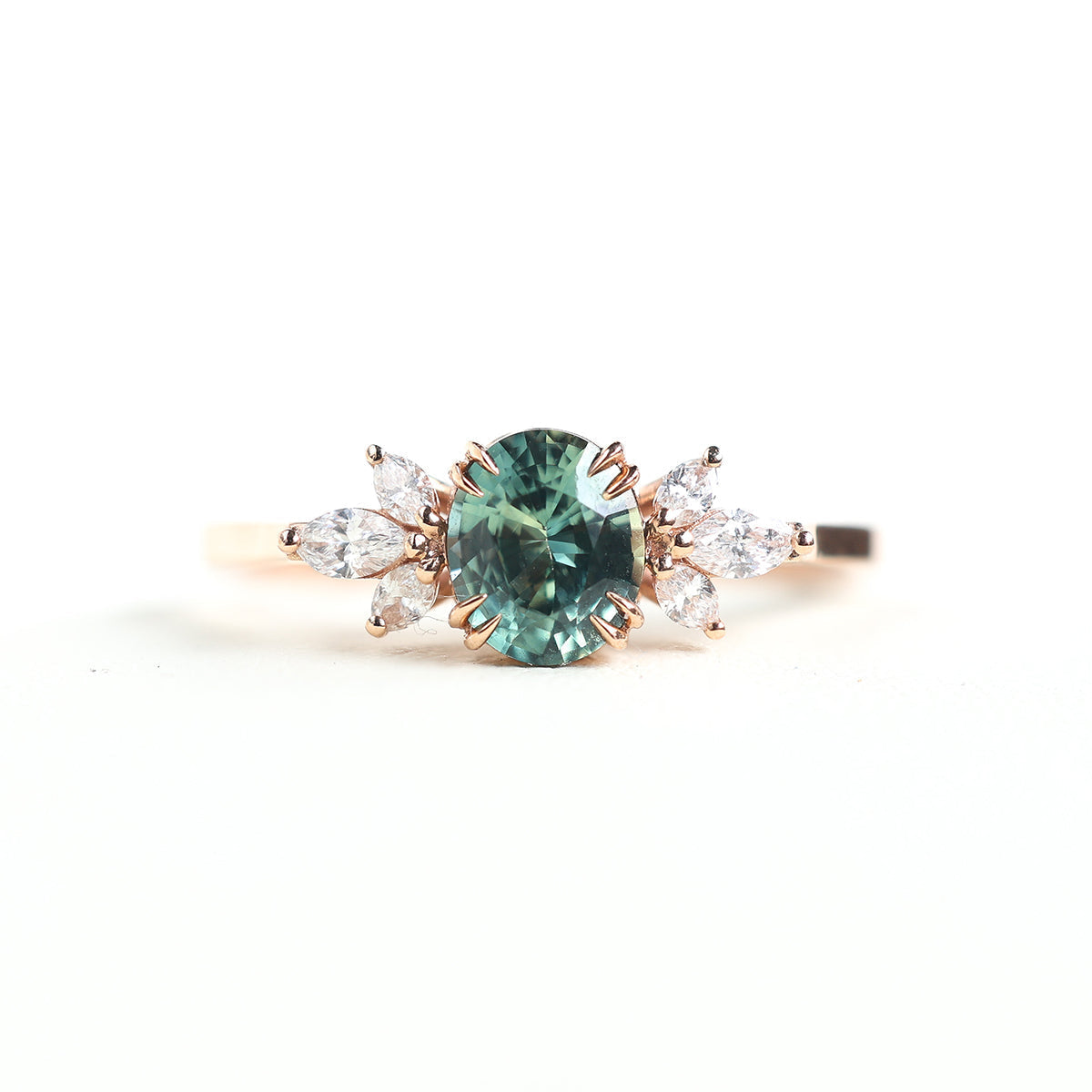 Teal sapphire and diamond ring