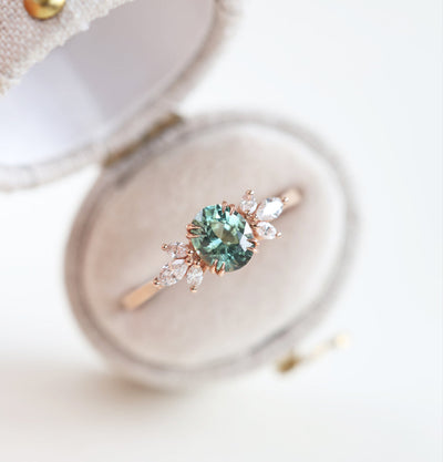 Teal sapphire and diamond ring