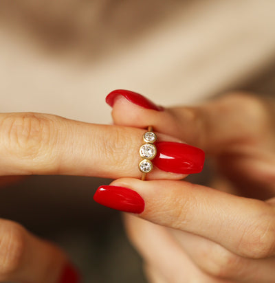 Three diamond ring bezel diamond engagement ring