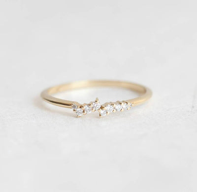Tiny round white diamond cluster ring