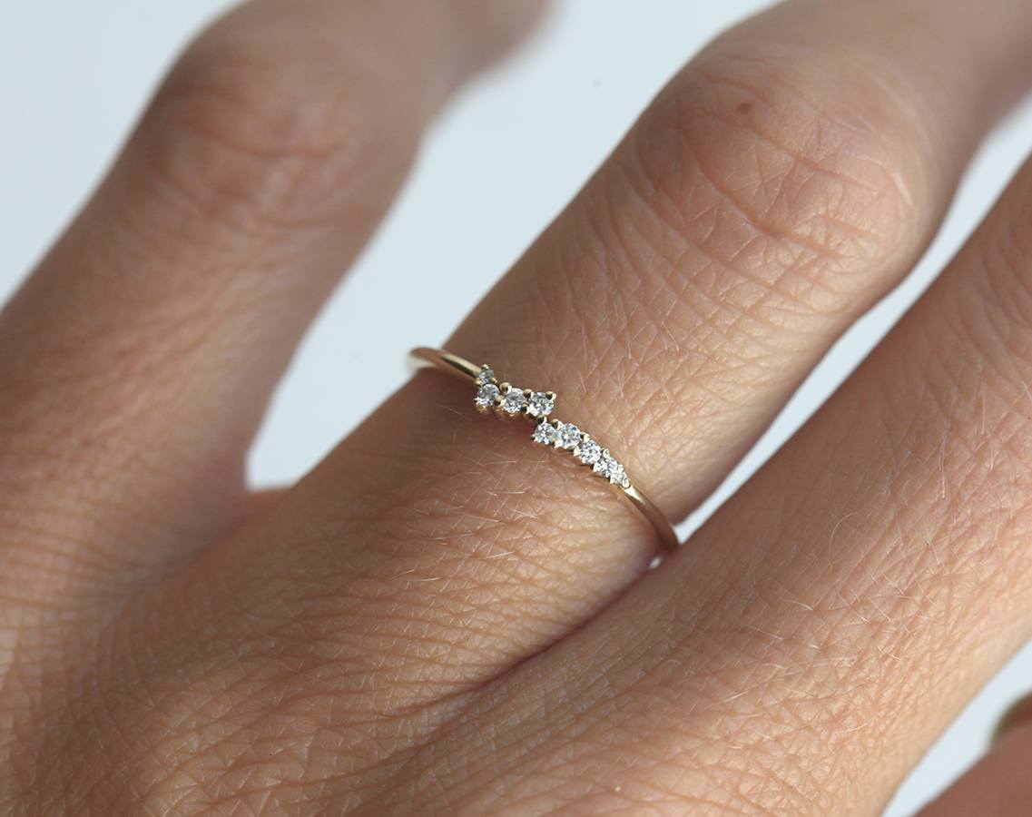Tiny round white diamond cluster ring