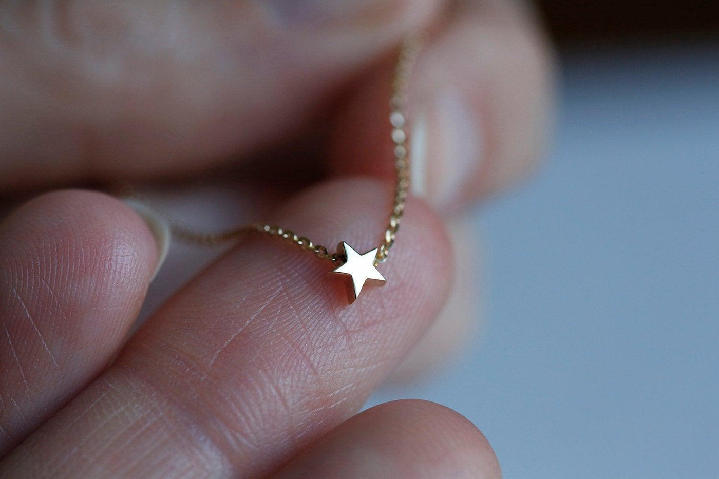 Gold star necklace