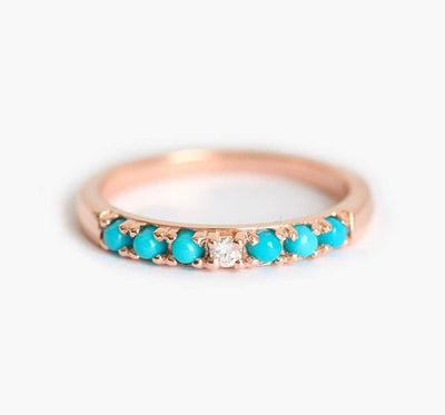 Round turquoise ring with centerpiece diamond