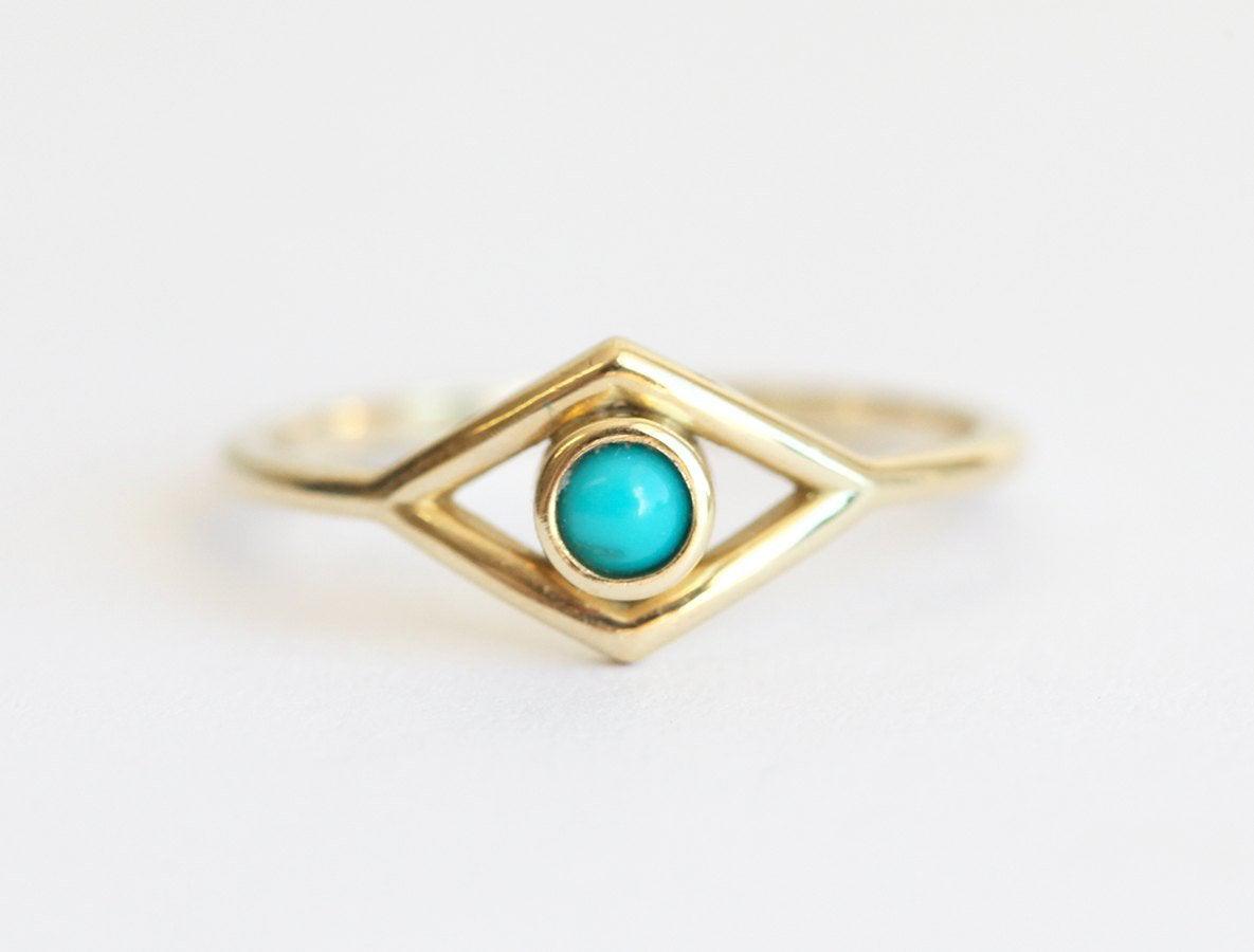 Evil Eye Shape Ring with Round Turquoise Gemstone Centerpiece