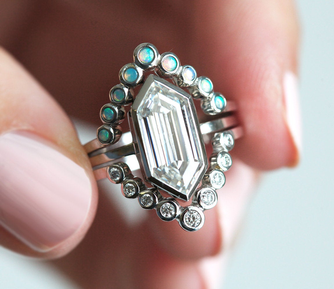 Nested hexagon-shaped white moissanite ring with diamond and australian opal gemstones