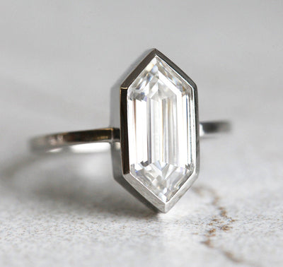 Nested hexagon-shaped white moissanite ring with diamond and australian opal gemstones