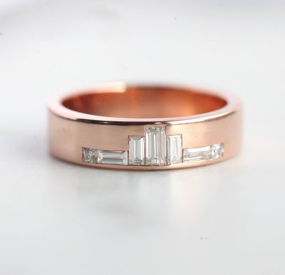 Baguette-cut diamond wedding band with side diamonds