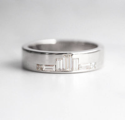 Baguette-cut diamond wedding band with side diamonds