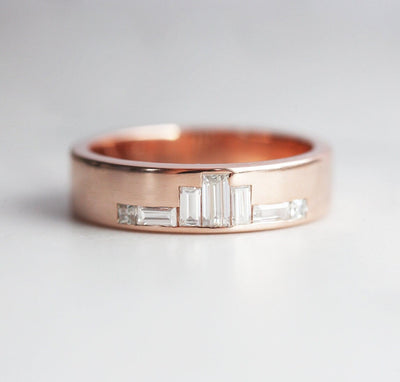 Baguette-cut diamond wedding band with side diamonds