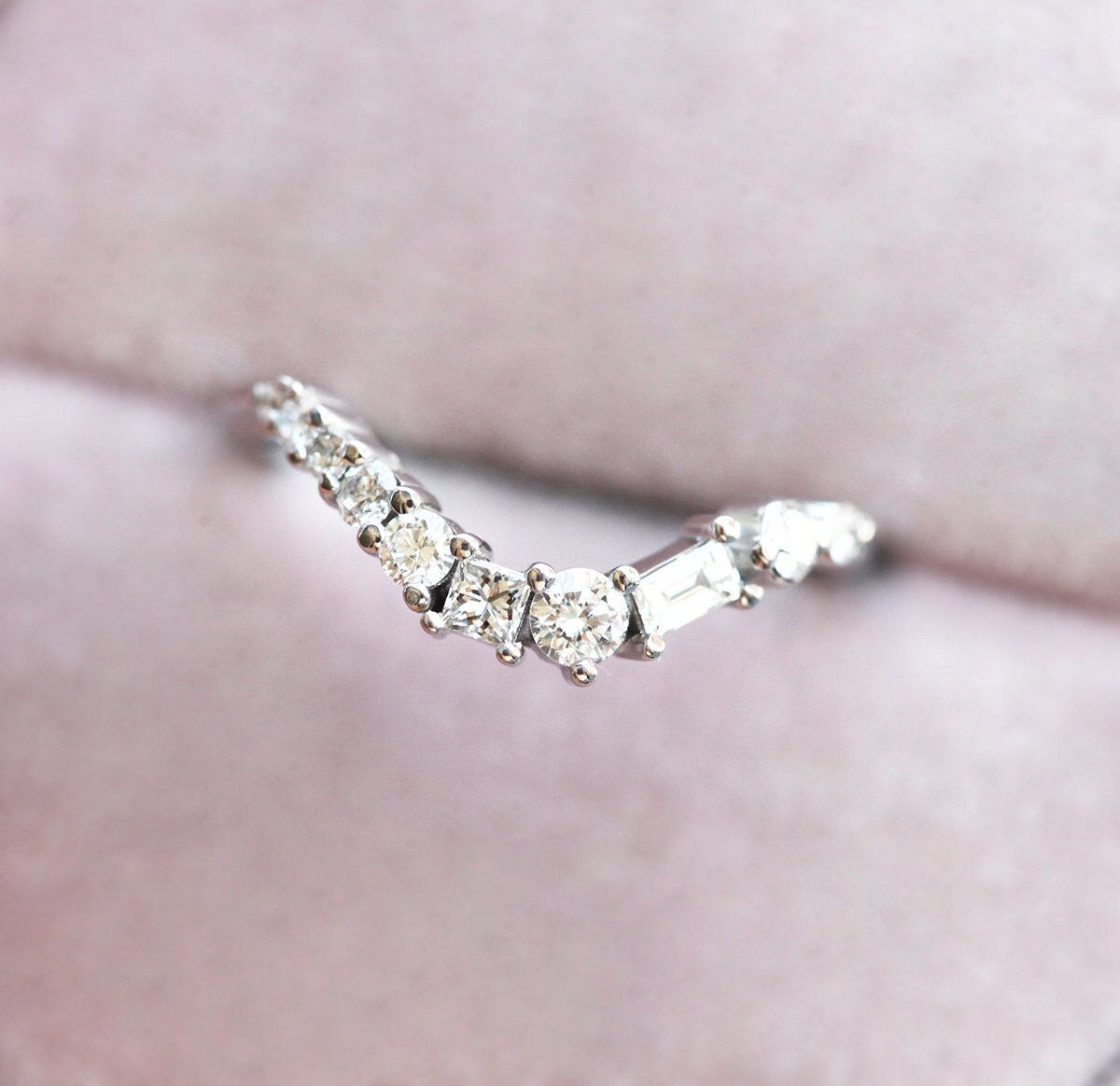 Nested white round, baguette-cut and princess-cut diamond ring