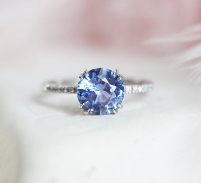 Round blue natural sapphire ring with white diamond pave
