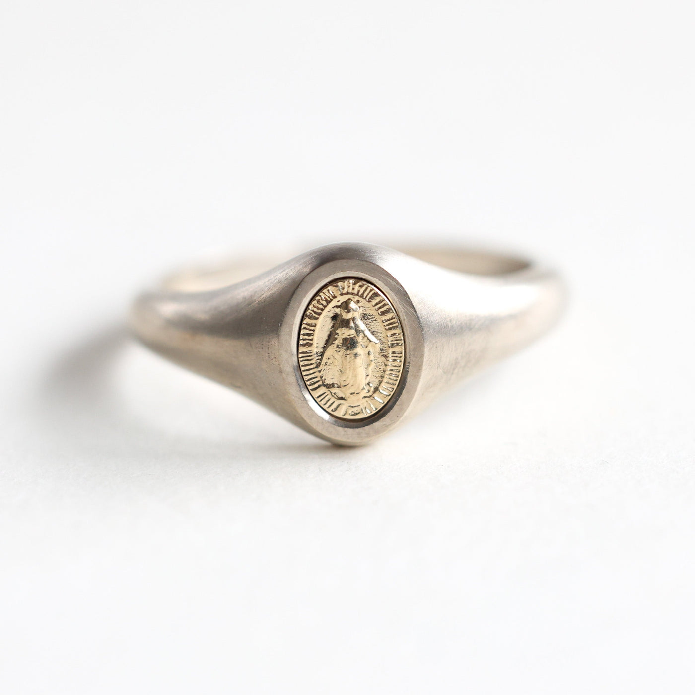 Minimalist Virgin Mary signet ring in 14K or 18K gold, featuring Mary measuring 7x5mm.