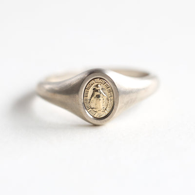 Minimalist Virgin Mary signet ring in 14K or 18K gold, featuring Mary measuring 7x5mm.