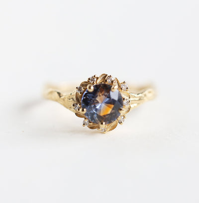 Whimsical round bicolor sapphire engagement ring