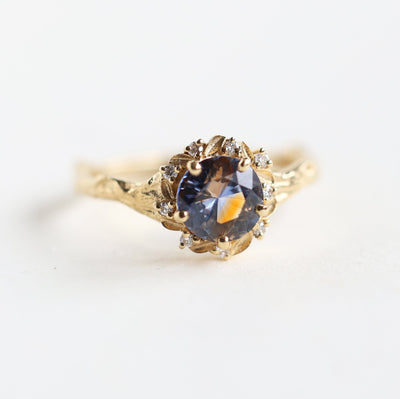 Whimsical round bicolor sapphire engagement ring