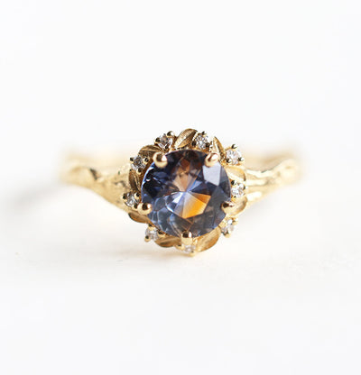 Whimsical round bicolor sapphire engagement ring