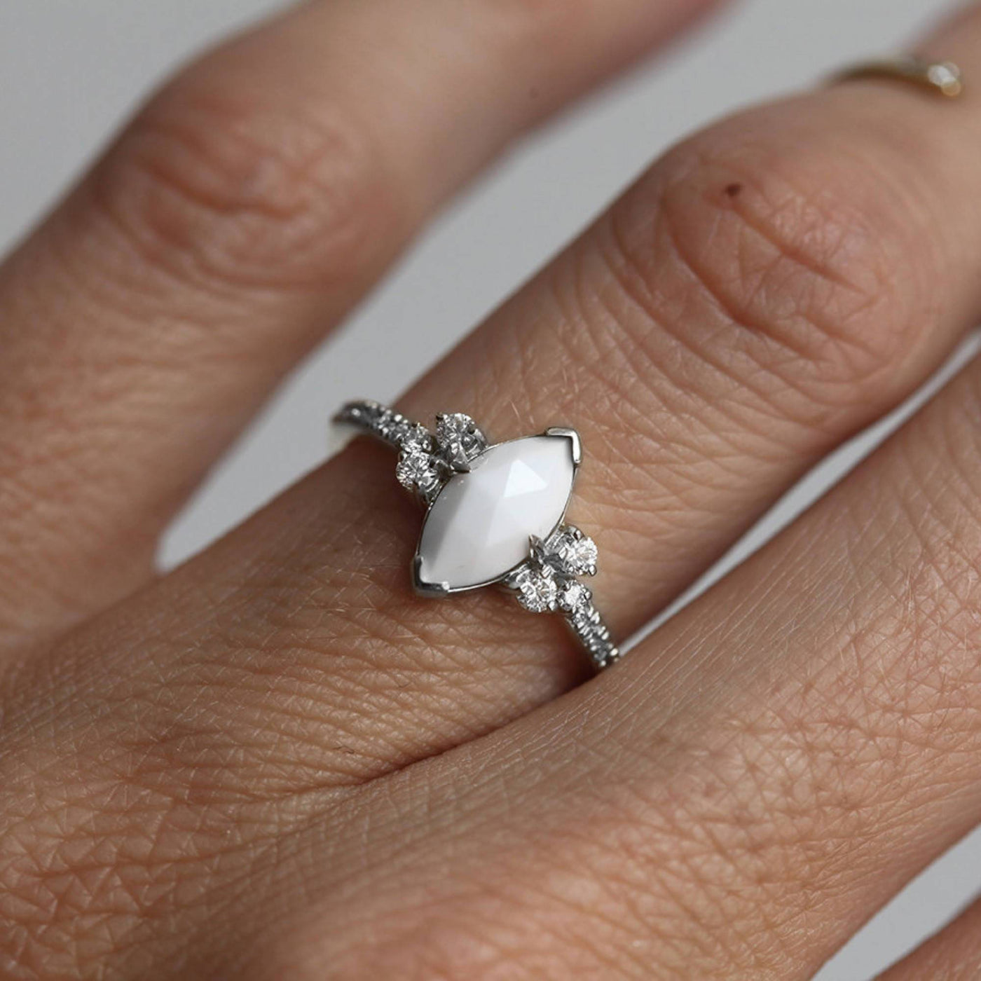 Marquise-cut white agate and diamond engagement ring