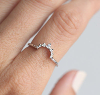 Nested pear-shaped white diamond crown ring