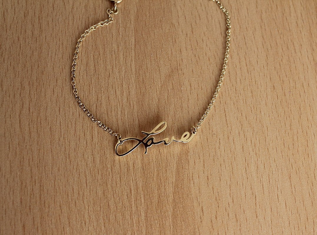Gold chain necklace with custom signature