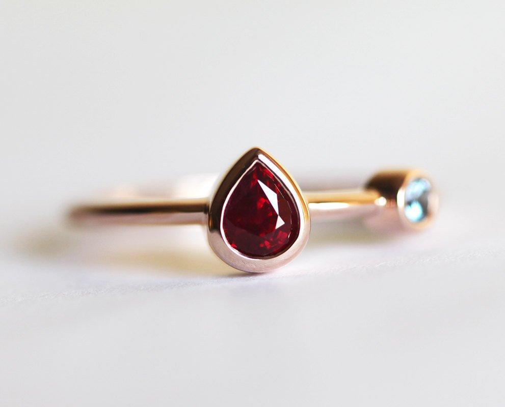Pear Ruby Engagement Ring with Round Aquamarine Side Gemstone