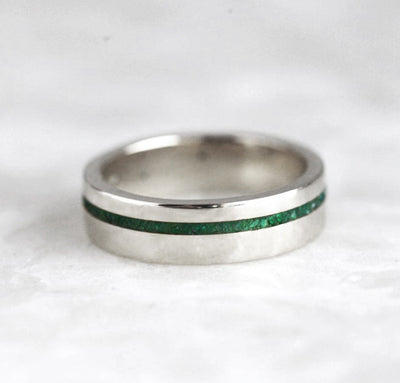 Silver ring with green emerald inlay, 5mm wide band, ideal for everyday wear.