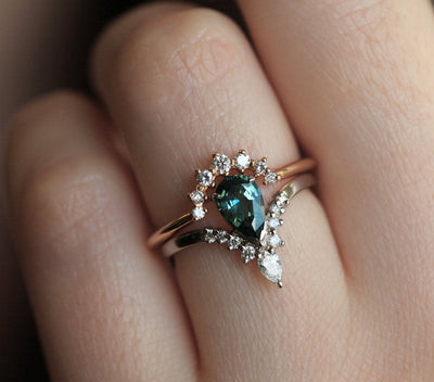 Pear-shaped teal sapphire prong ring with white diamonds