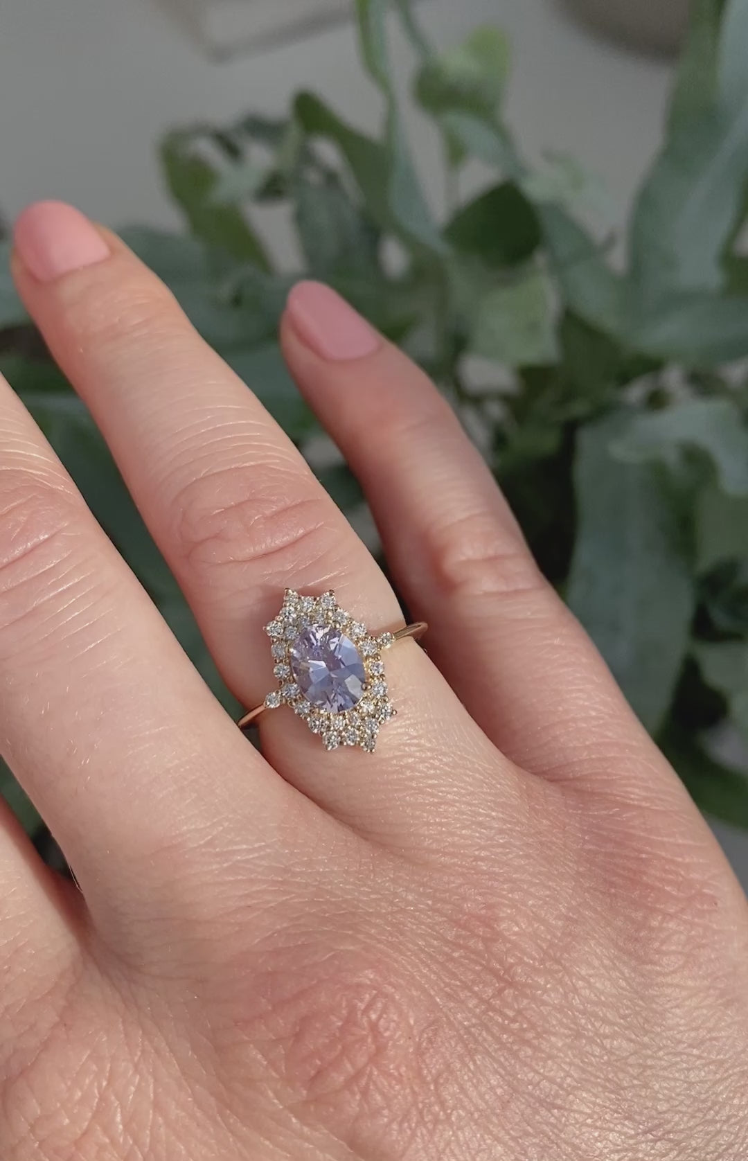 Oval-shaped lavender sapphire ring with diamond halo video