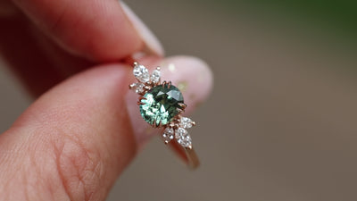 Teal sapphire and diamond ring