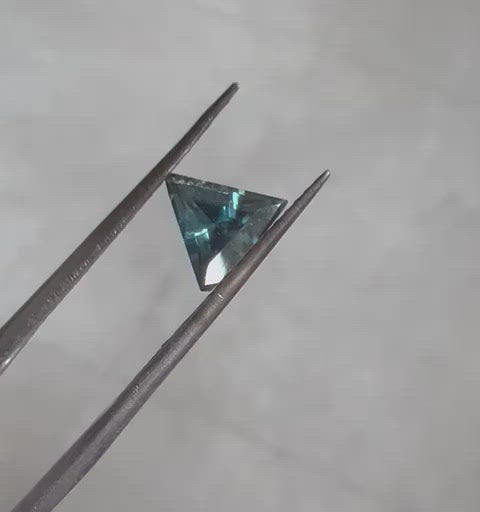 Loose triangle-shaped teal sapphire video
