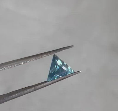 Loose triangle-cut teal sapphire  video