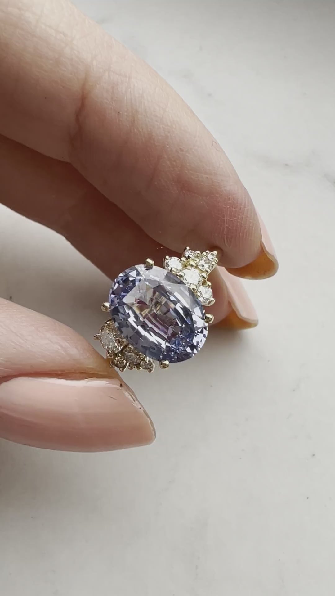 Oval-shaped blue sapphire ring with side diamonds video