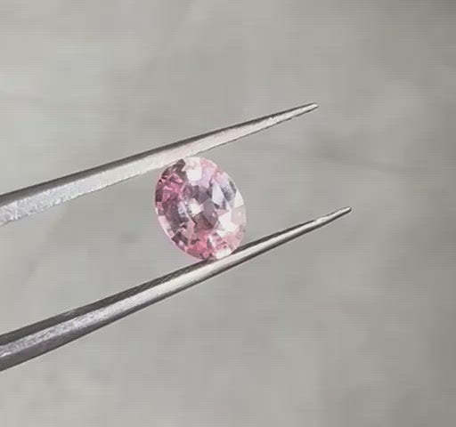 Loose oval-shaped peach pink sapphire video