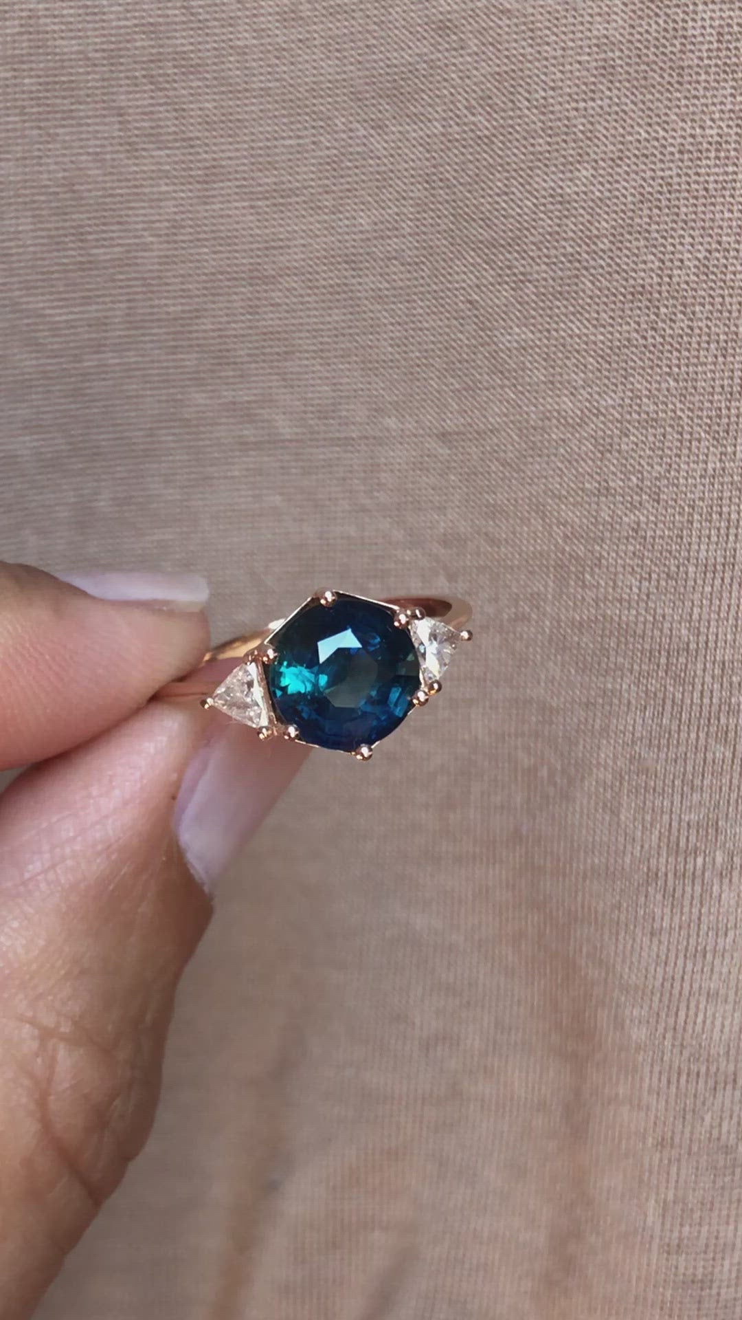 Round teal sapphire ring with white side diamonds video
