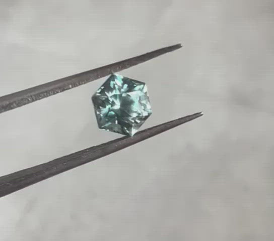 Loose hexagon-shaped teal sapphire video