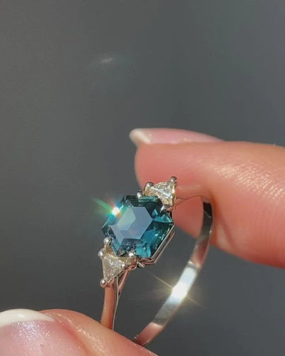 Hexagon-shaped teal sapphire ring with side diamonds video