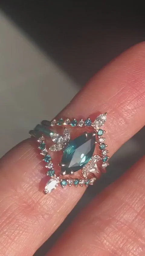 Marquise-cut teal sapphire with white side diamonds video