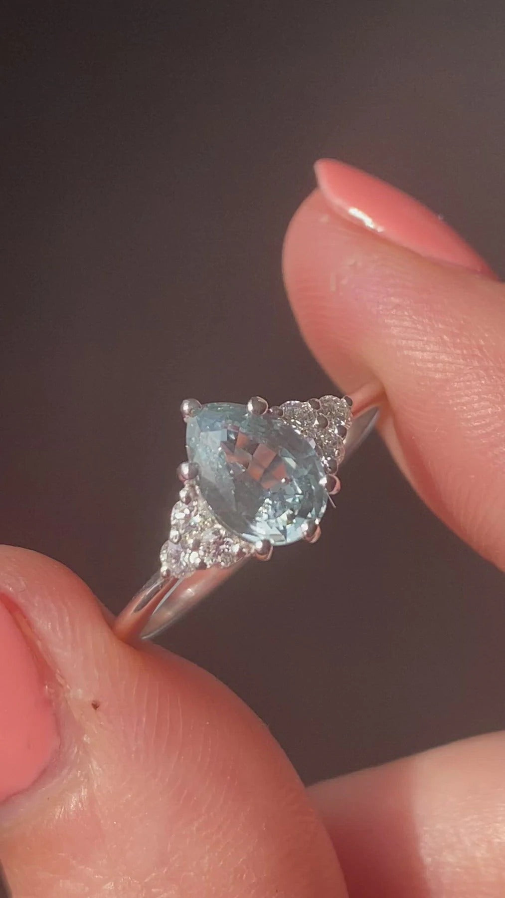 Pear-shaped mint sapphire with side diamonds video