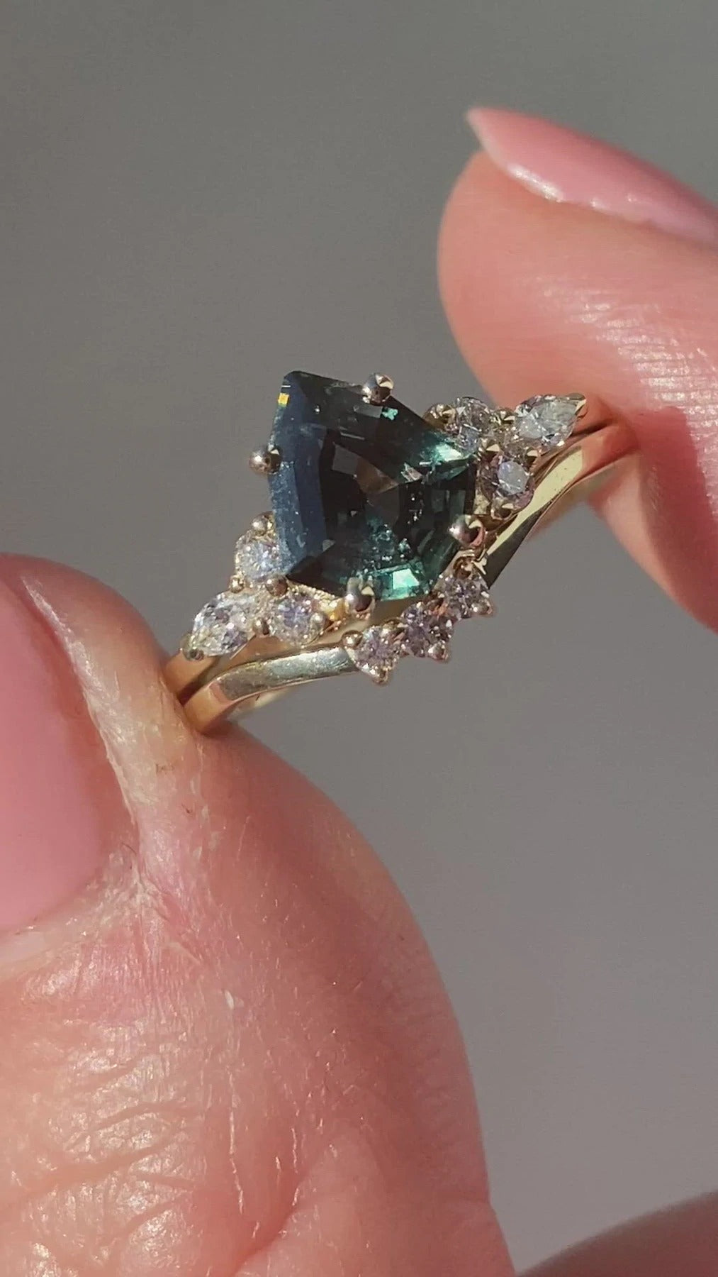 Pear-shaped blue green sapphire cluster ring with diamonds video
